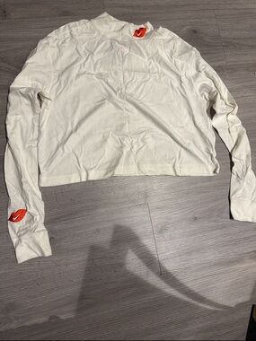 Nike Women's White Long Sleeve Crop Top with Red Lip Accents